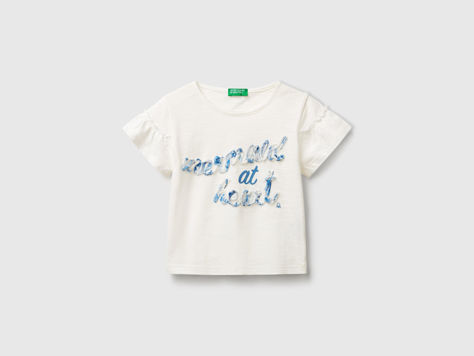 T-shirt con applicazione da bimba bianco panna | Benetton Outlet