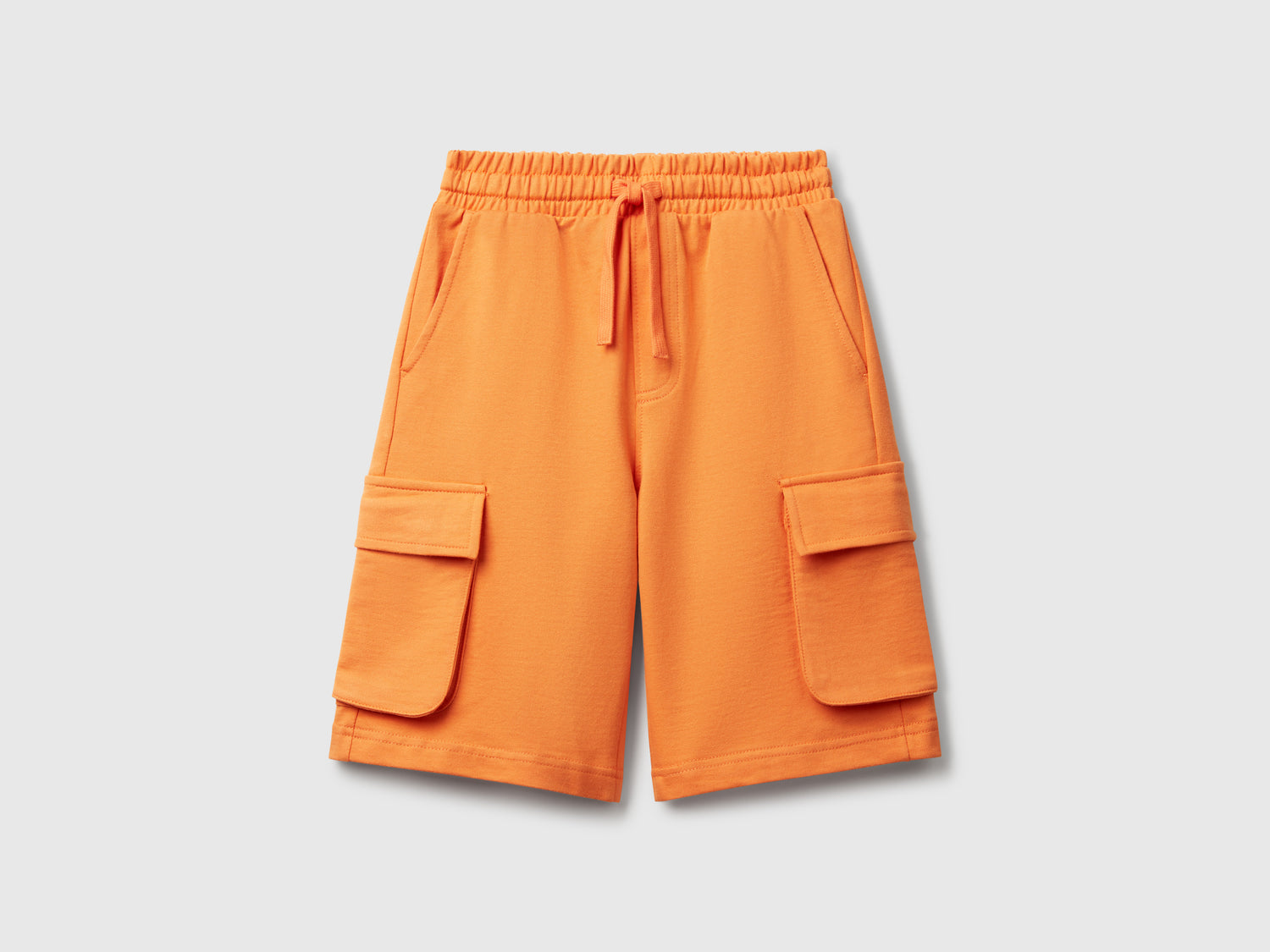 Shorts cargo in felpa leggera da bambino arancione | Benetton Outlet