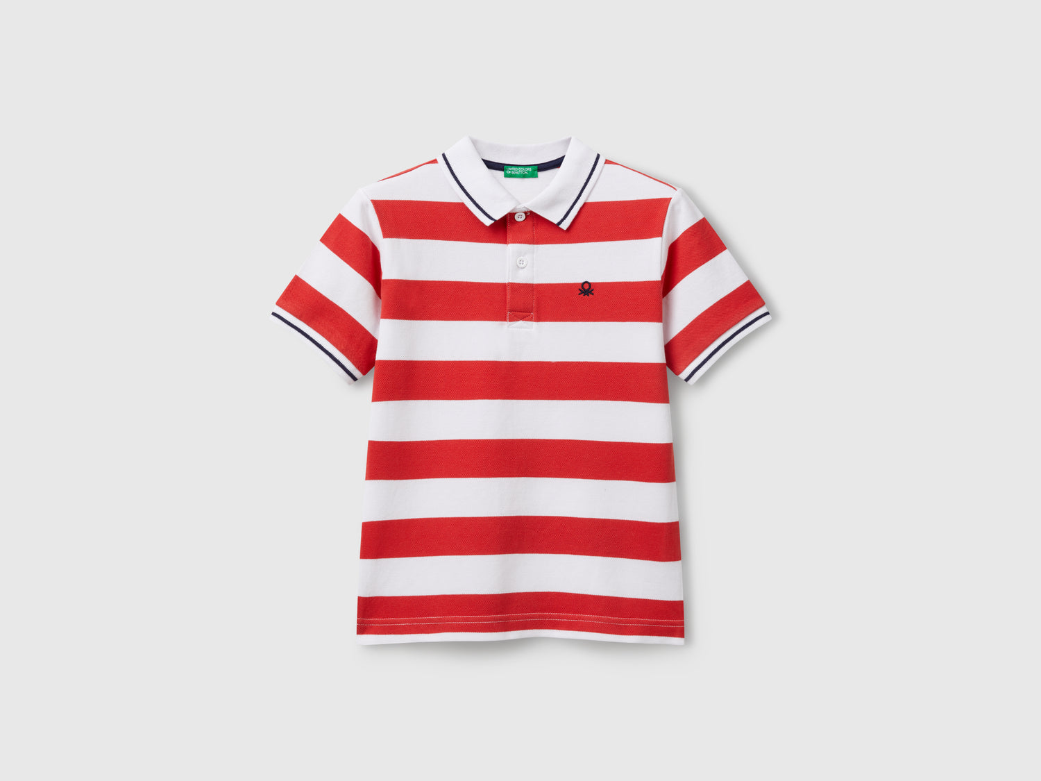 Polo manica corta a righe da bambino rosso | Benetton Outlet