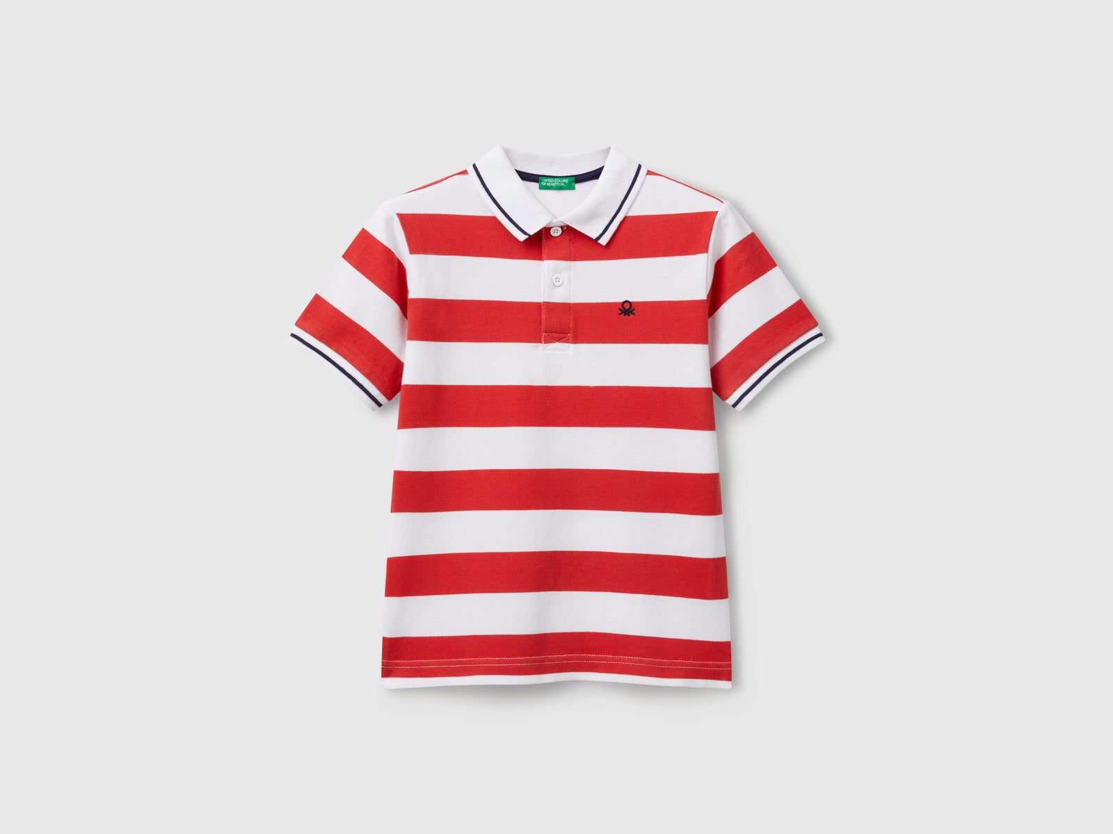 Polo manica corta a righe da bambino rosso | Benetton Outlet