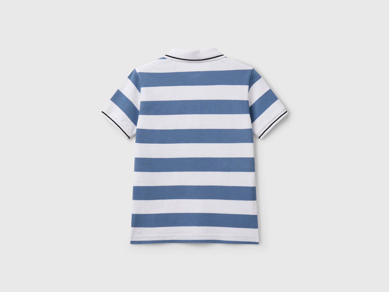 Polo manica corta a righe da bambino azzurro 2 | Benetton Outlet