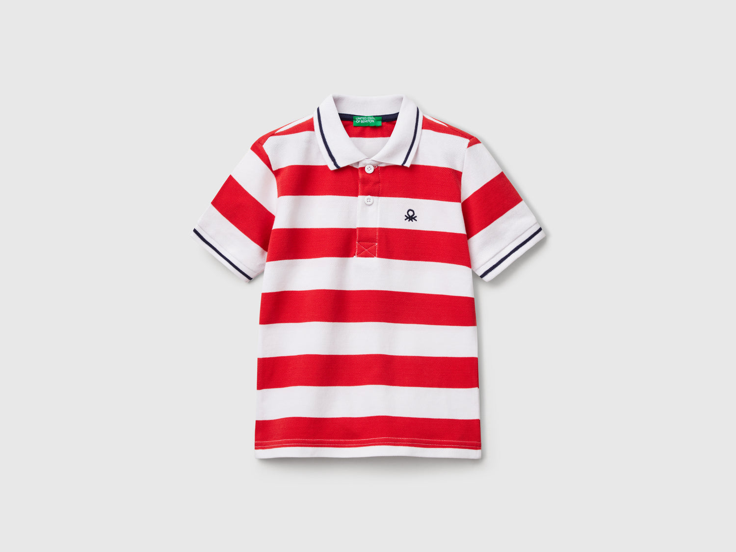 Polo manica corta a righe da bimbo rosso | Benetton Outlet