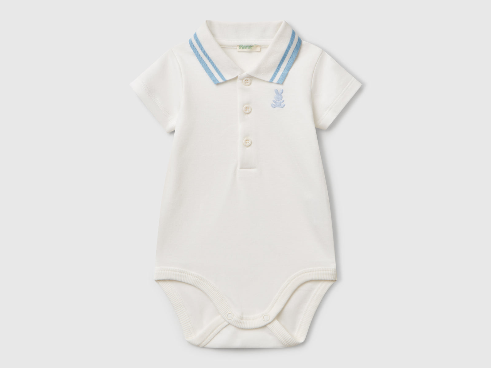 Body a polo in cotone da neonato bianco panna | Benetton Outlet