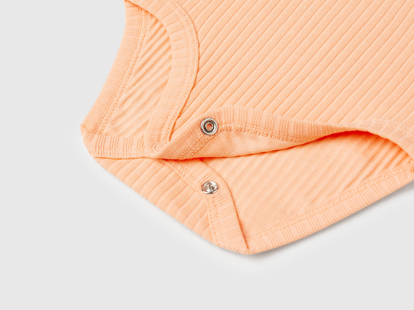 Body con colletto in cotone stretch da neonato pesca 3 | Benetton Outlet