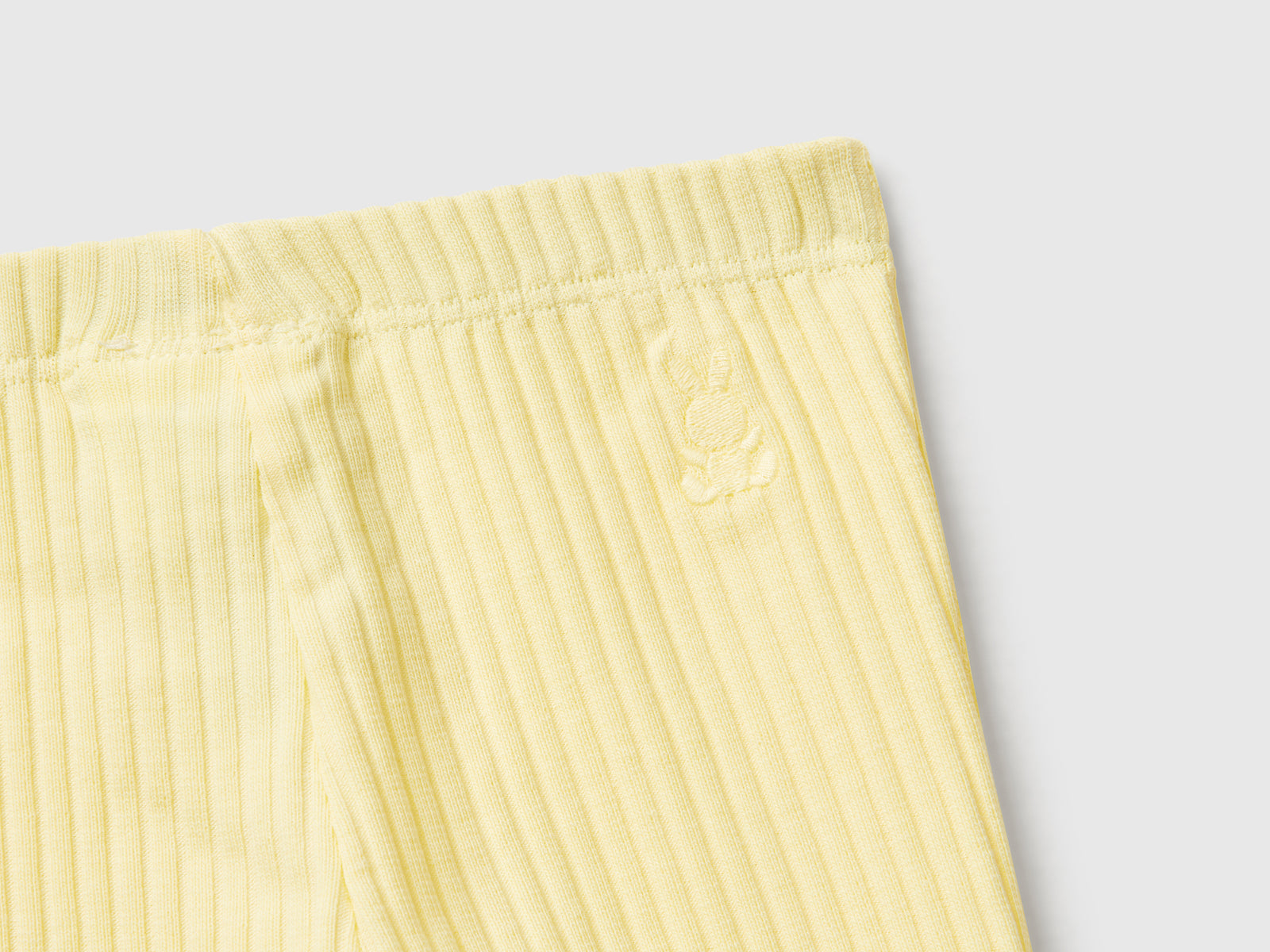 Leggings in cotone stretch da neonato giallo 3 | Benetton Outlet