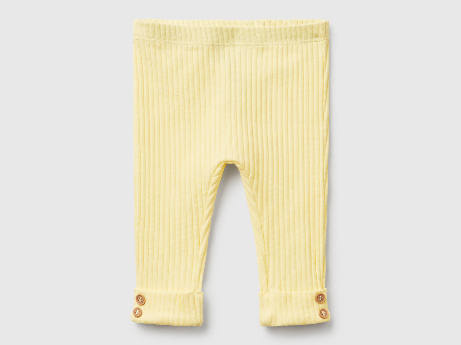Leggings in cotone stretch da neonato giallo | Benetton Outlet
