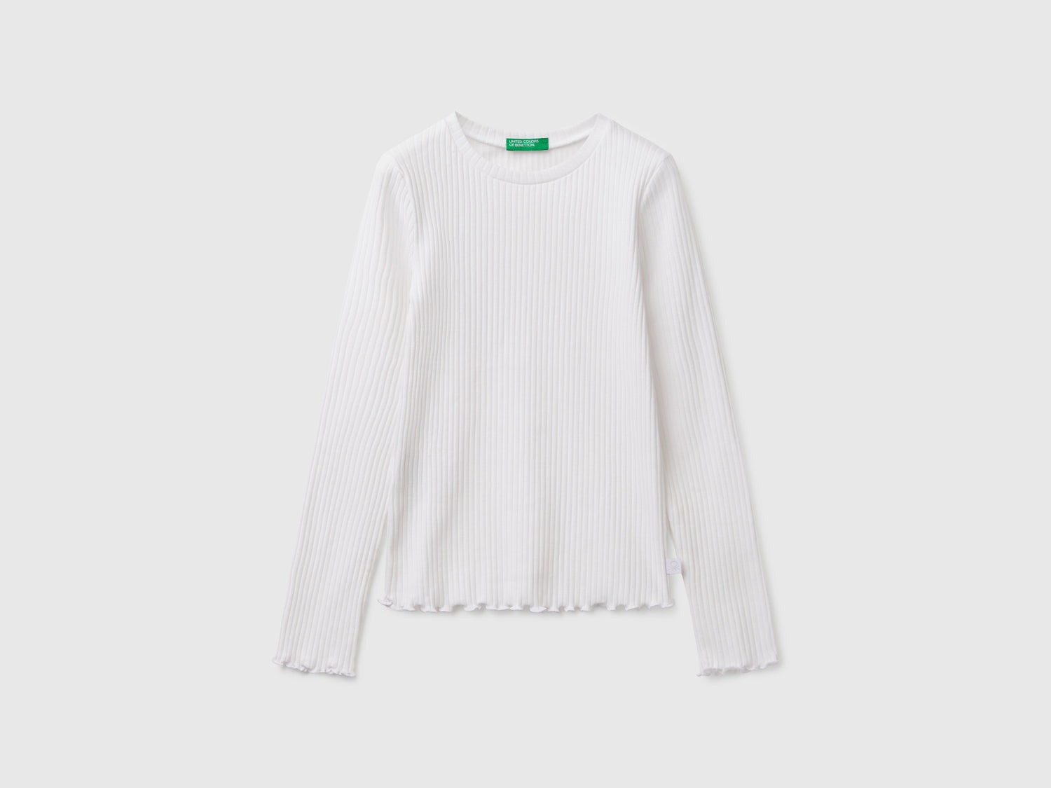 Maglietta slim fit in cotone stretch da bambina bianco | Benetton Outlet