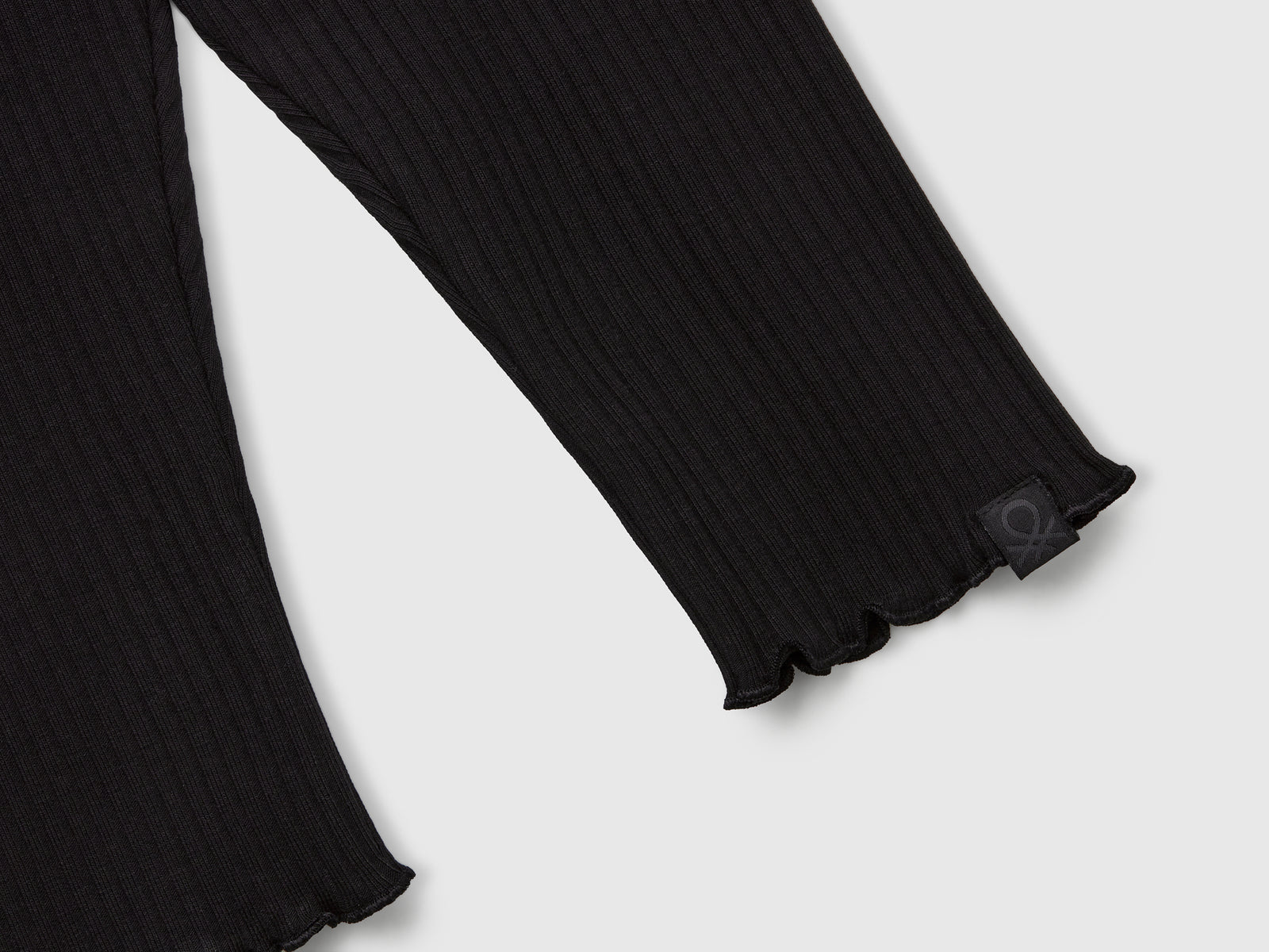 Leggings in cotone stretch da bimba nero 3 | Benetton Outlet