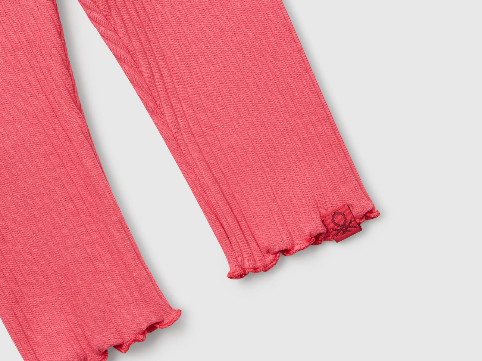 Leggings in cotone stretch da bimba salmone 3 | Benetton Outlet