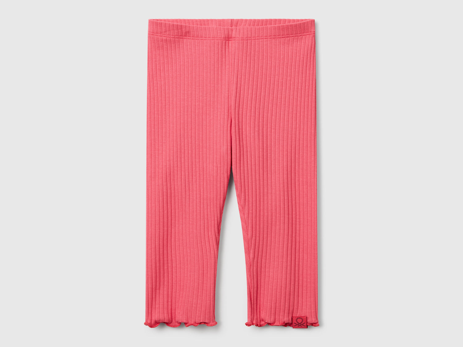 Leggings in cotone stretch da bimba salmone | Benetton Outlet
