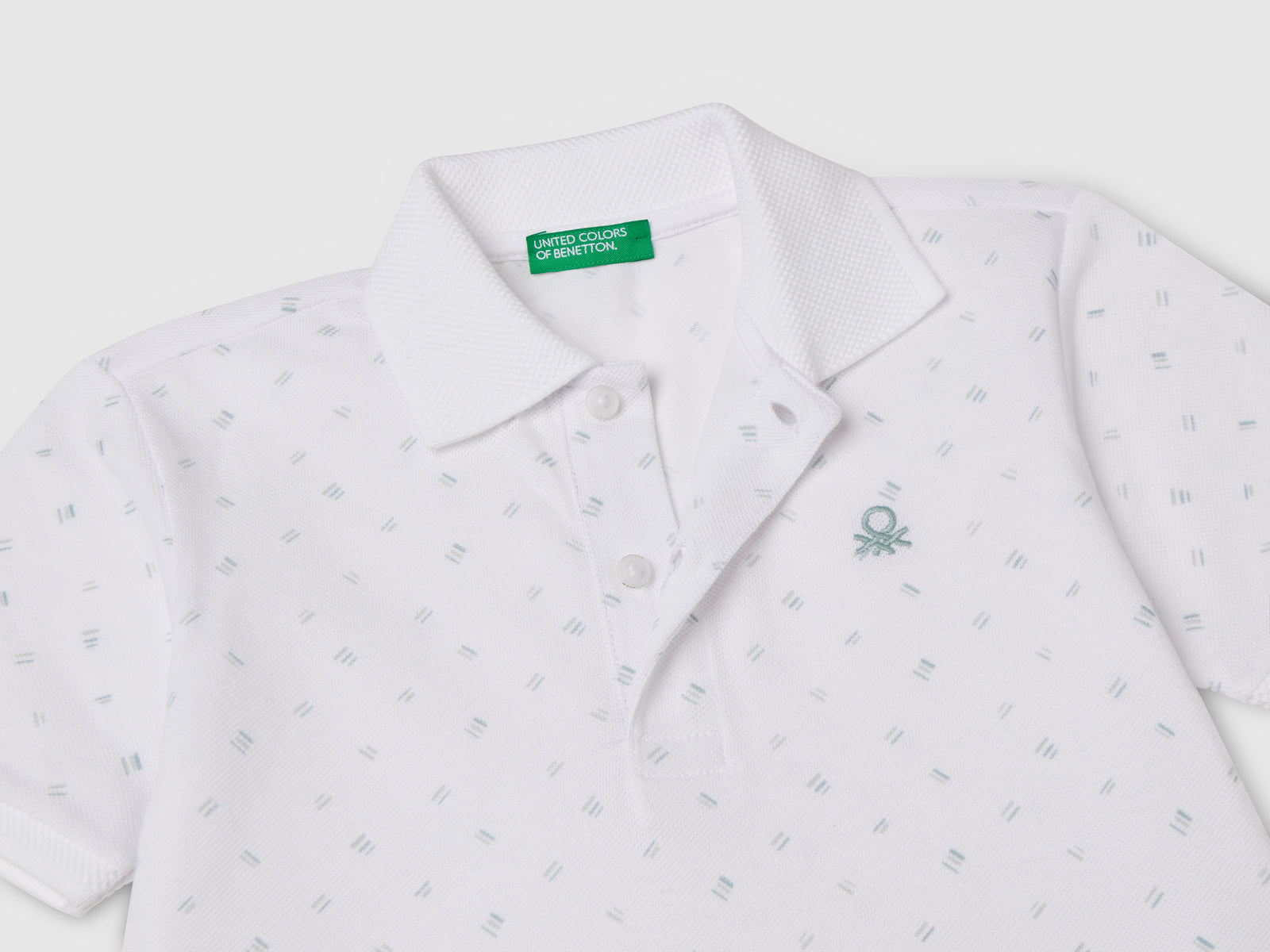 Polo micro fantasia in puro cotone da bimbo bianco 3 | Benetton Outlet