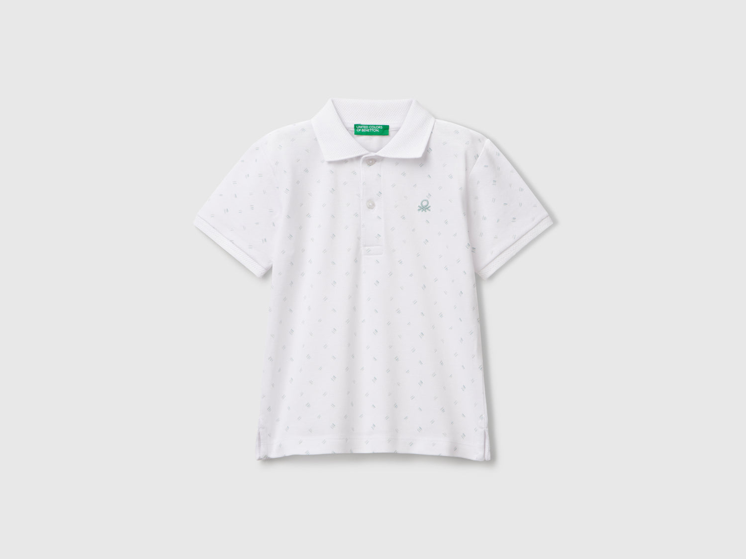Polo micro fantasia in puro cotone da bimbo bianco | Benetton Outlet