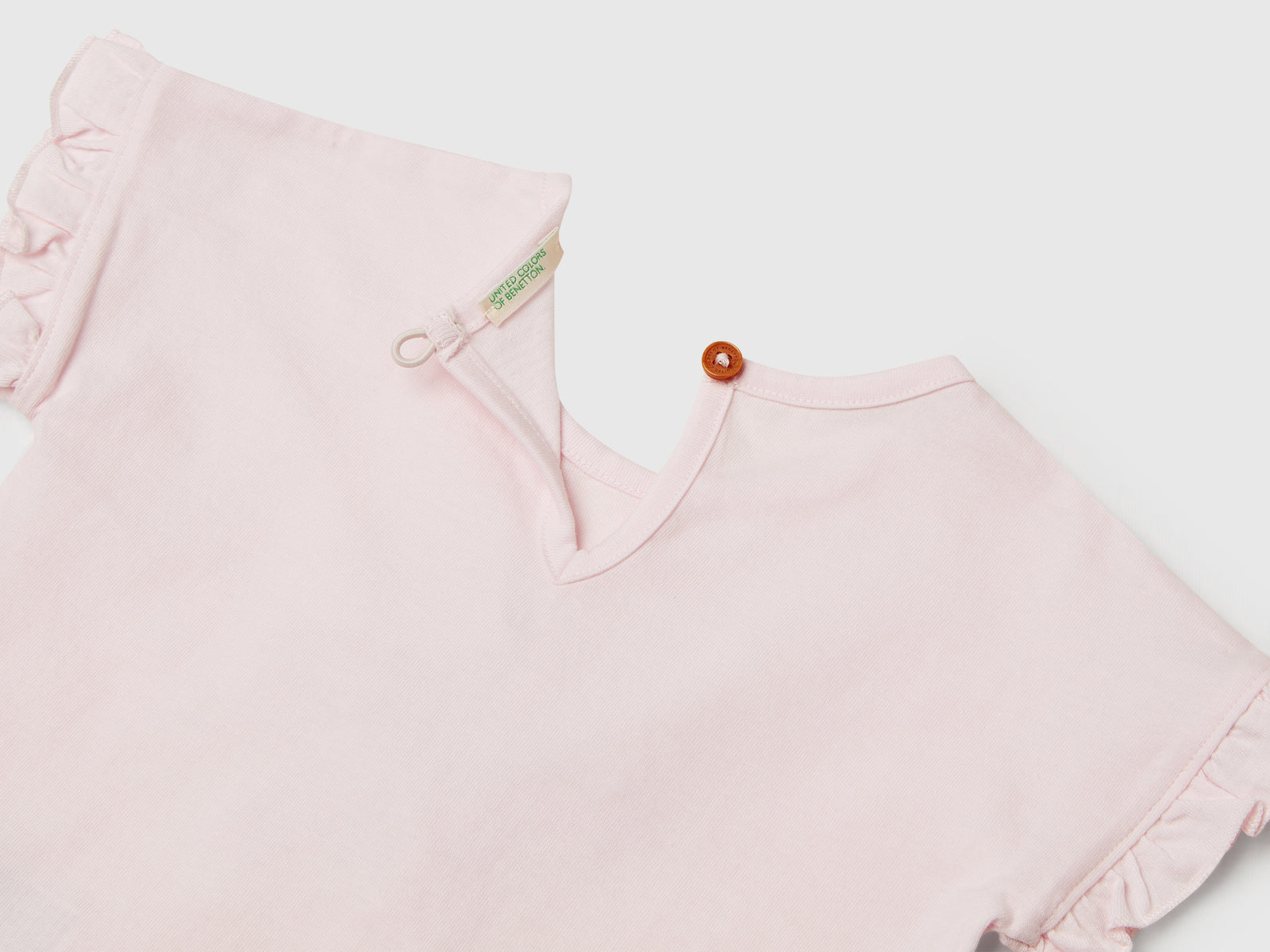Maglietta con ricamo e nappine da neonato rosa 3 | Benetton Outlet