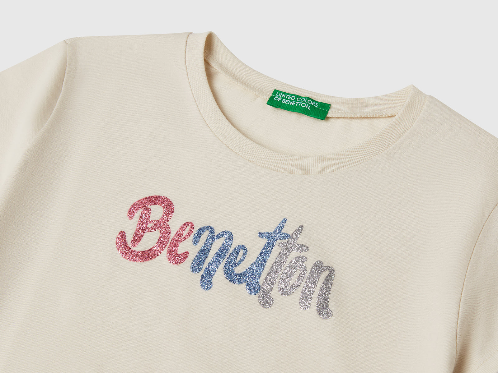 T-shirt con logo glitter in cotone da bambina beige 3 | Benetton Outlet