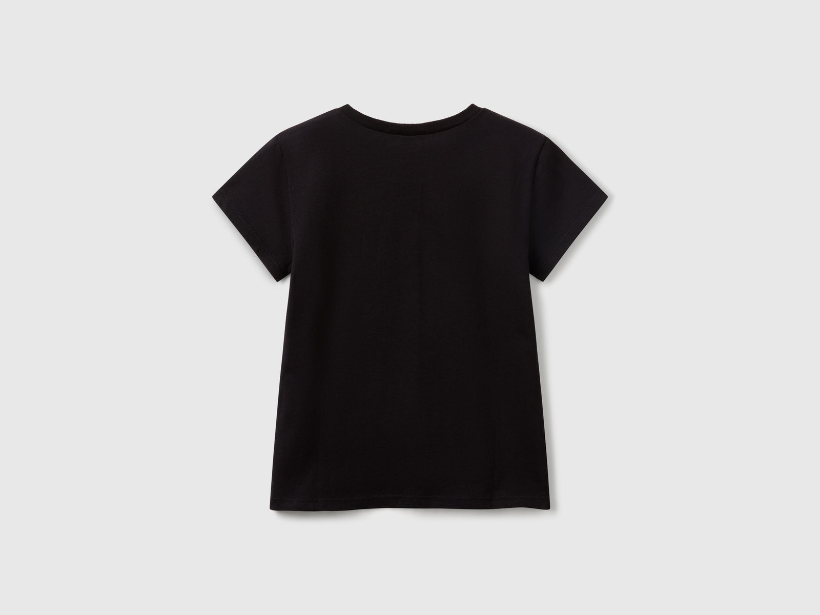 T-shirt con logo glitter in cotone da bambina nero 2 | Benetton Outlet