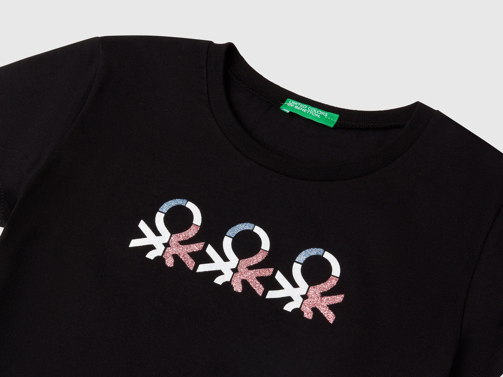 T-shirt con logo glitter in cotone da bambina nero 3 | Benetton Outlet