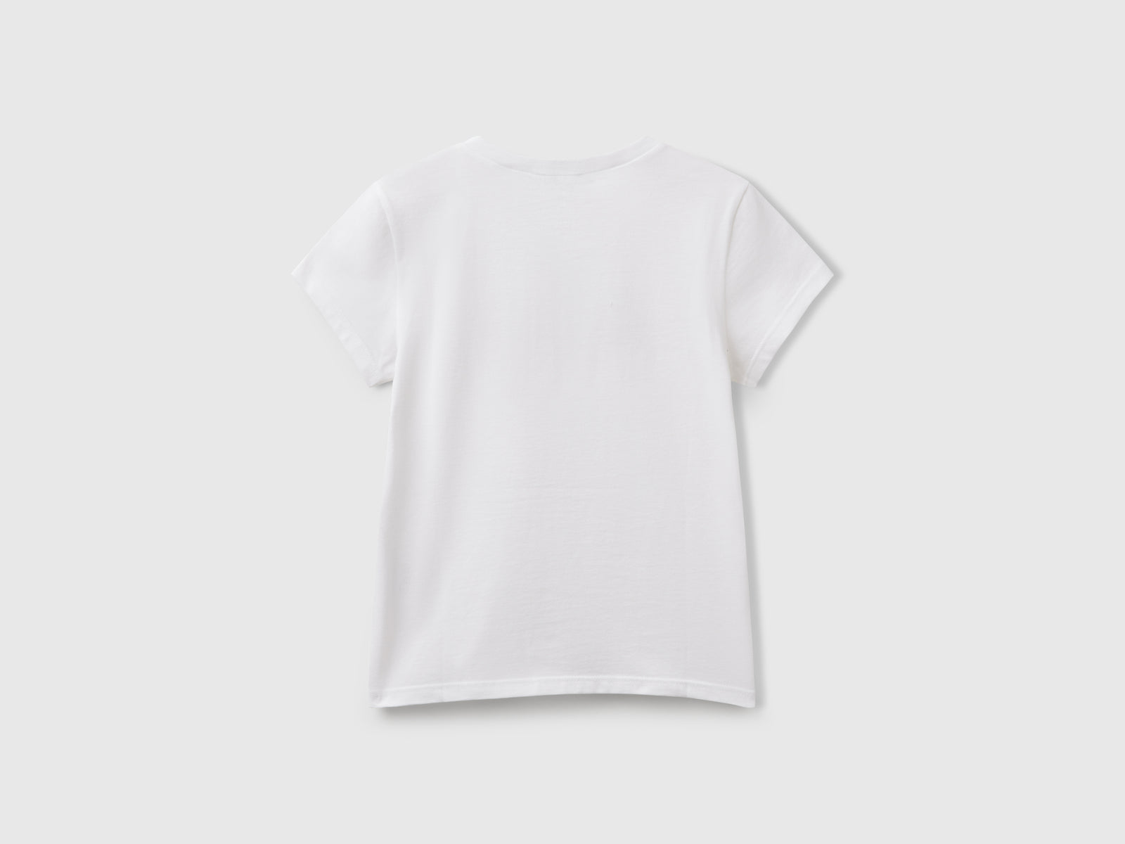 T-shirt con logo glitter in cotone da bambina bianco 2 | Benetton Outlet