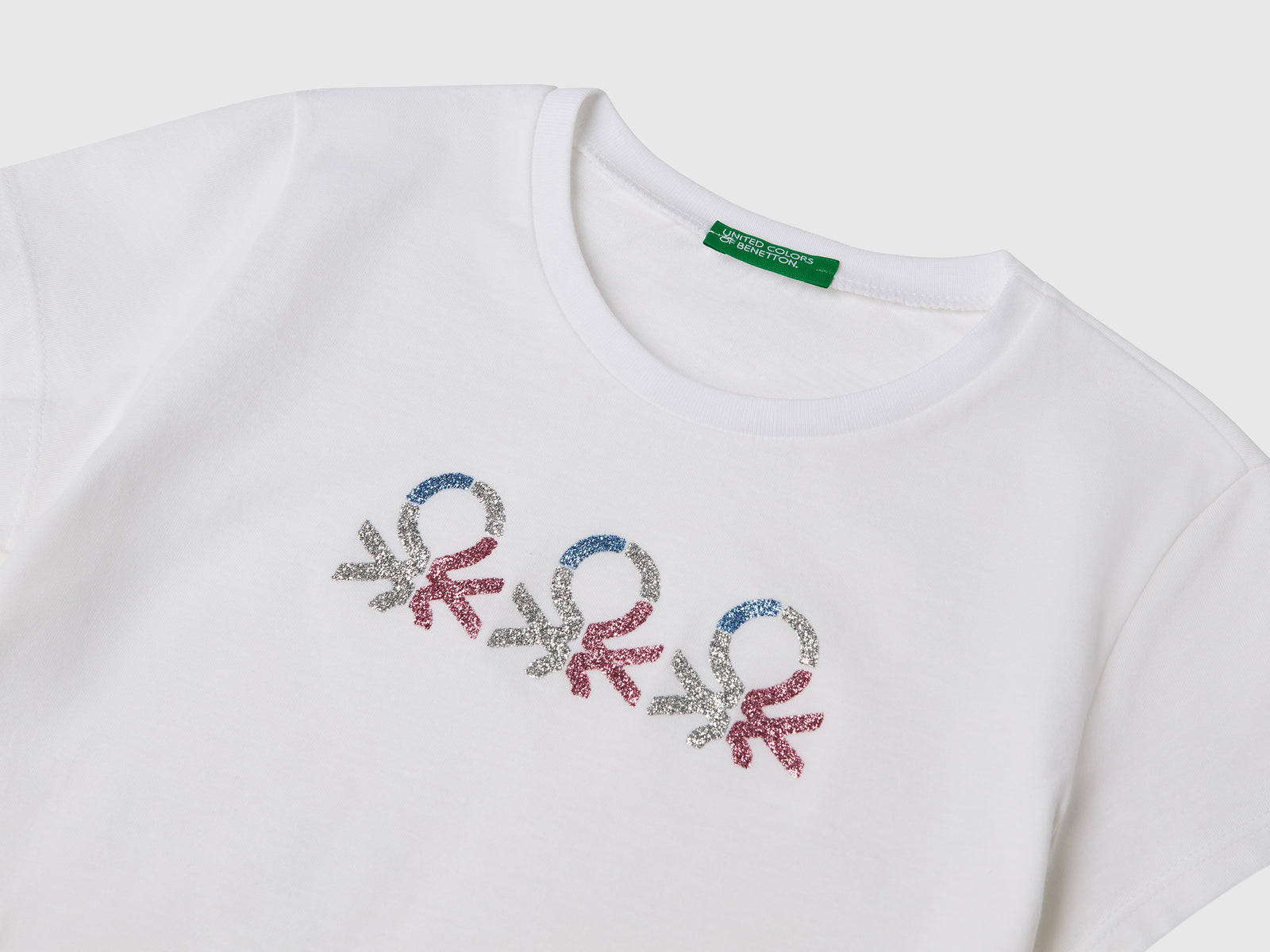 T-shirt con logo glitter in cotone da bambina bianco 3 | Benetton Outlet