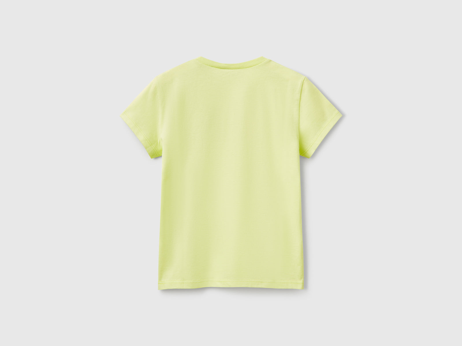 T-shirt con logo glitter in cotone da bambina lime 2 | Benetton Outlet