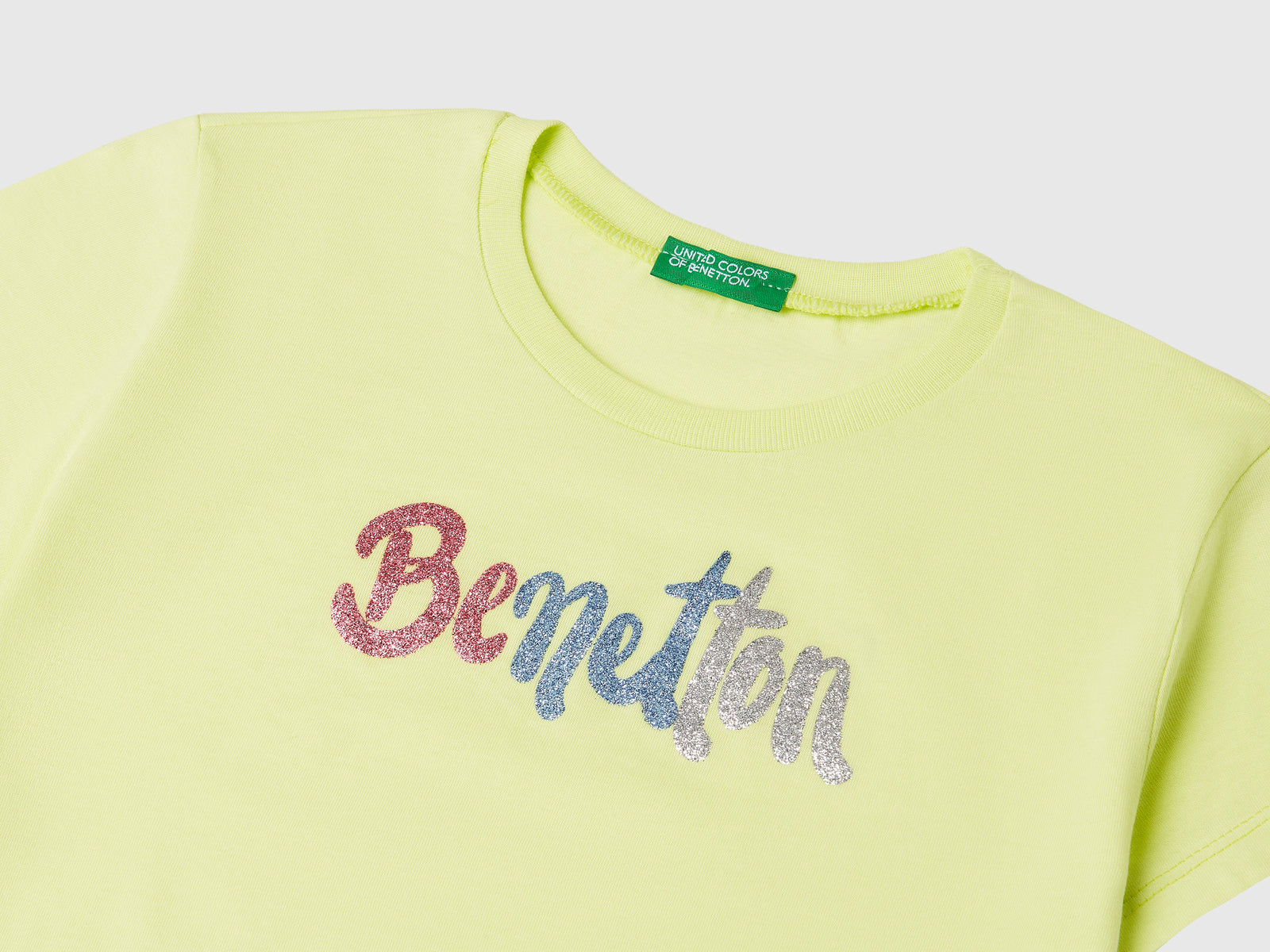 T-shirt con logo glitter in cotone da bambina lime 3 | Benetton Outlet