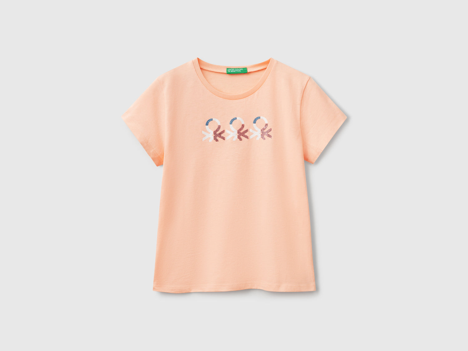 T-shirt con logo glitter in cotone da bambina pesca | Benetton Outlet