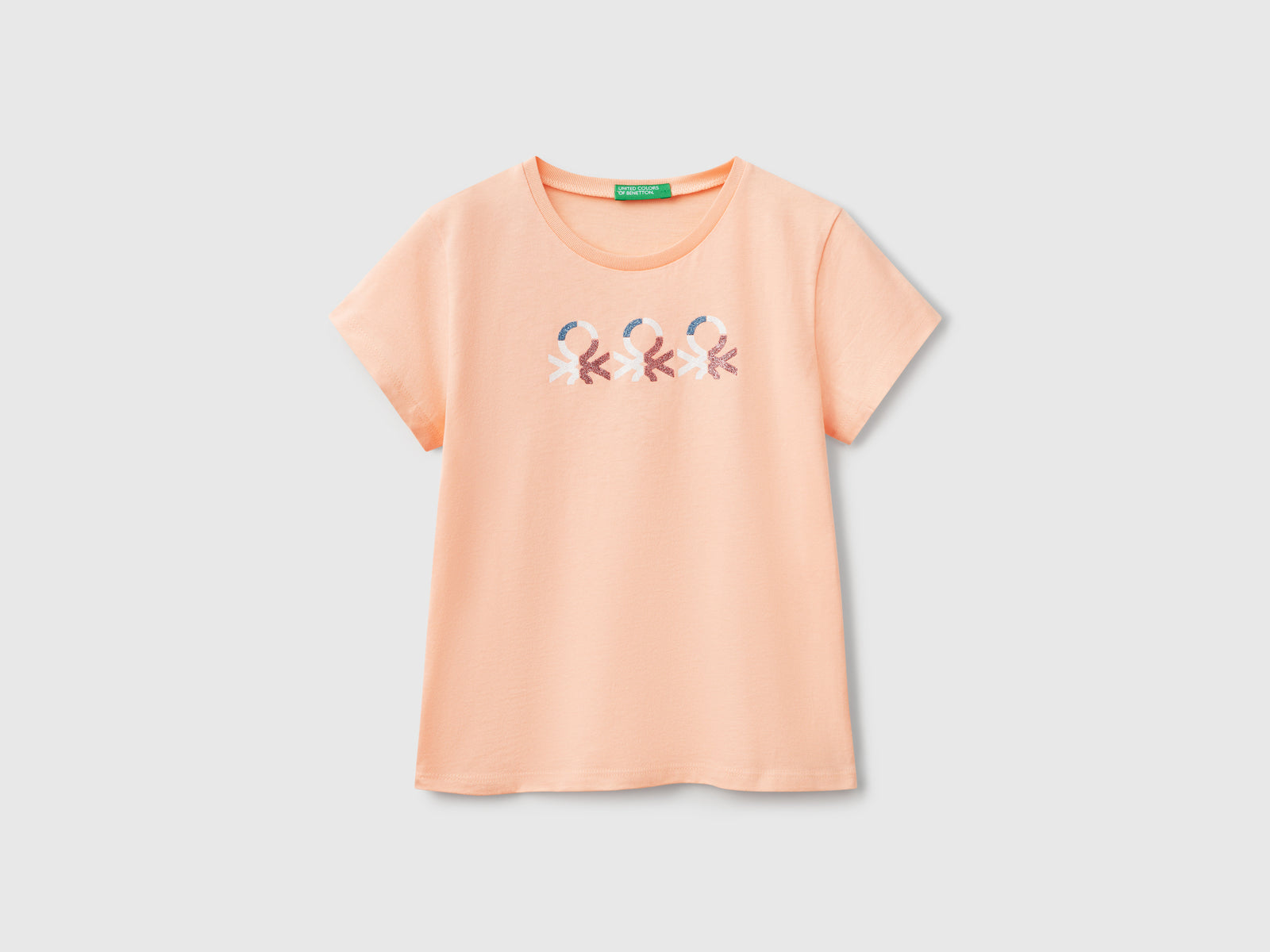 T-shirt con logo glitter in cotone da bambina pesca | Benetton Outlet