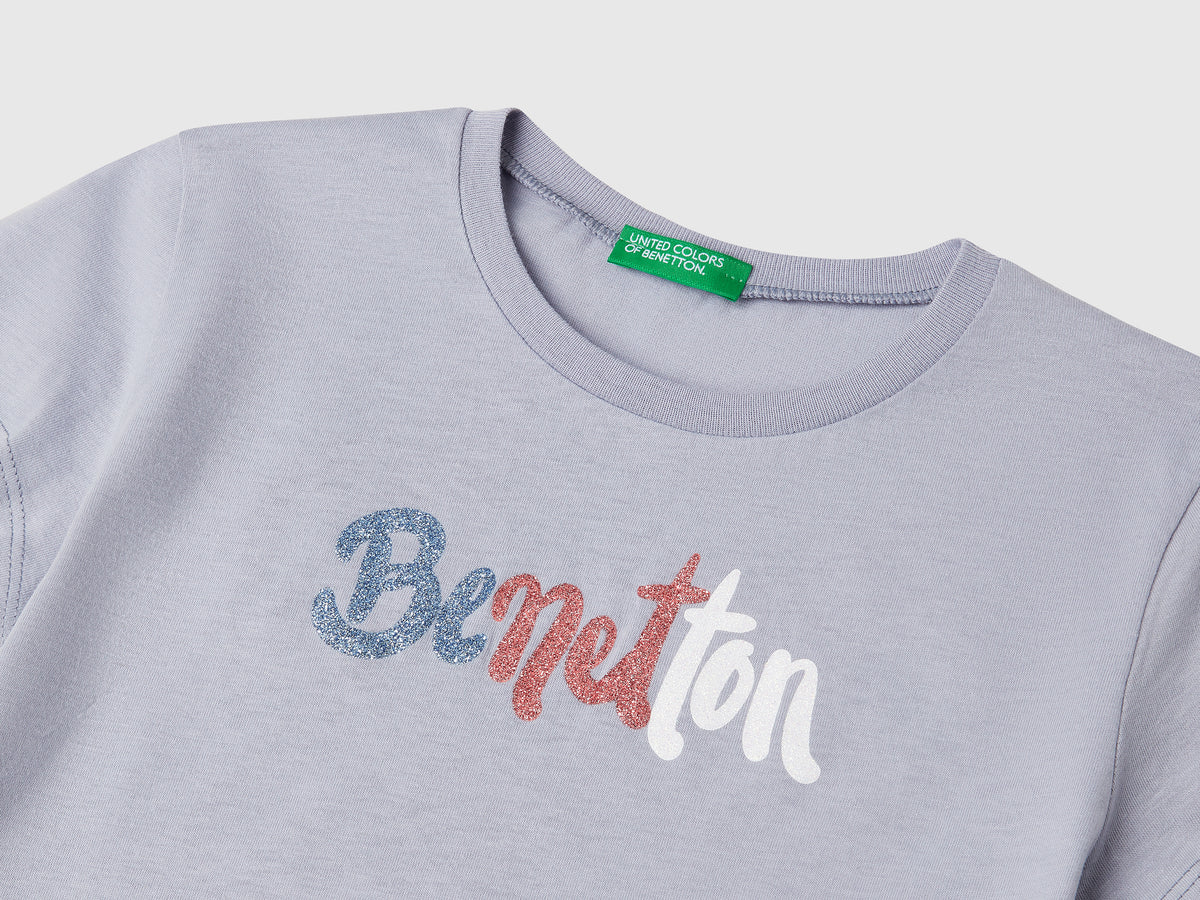 T-shirt con logo glitter in cotone