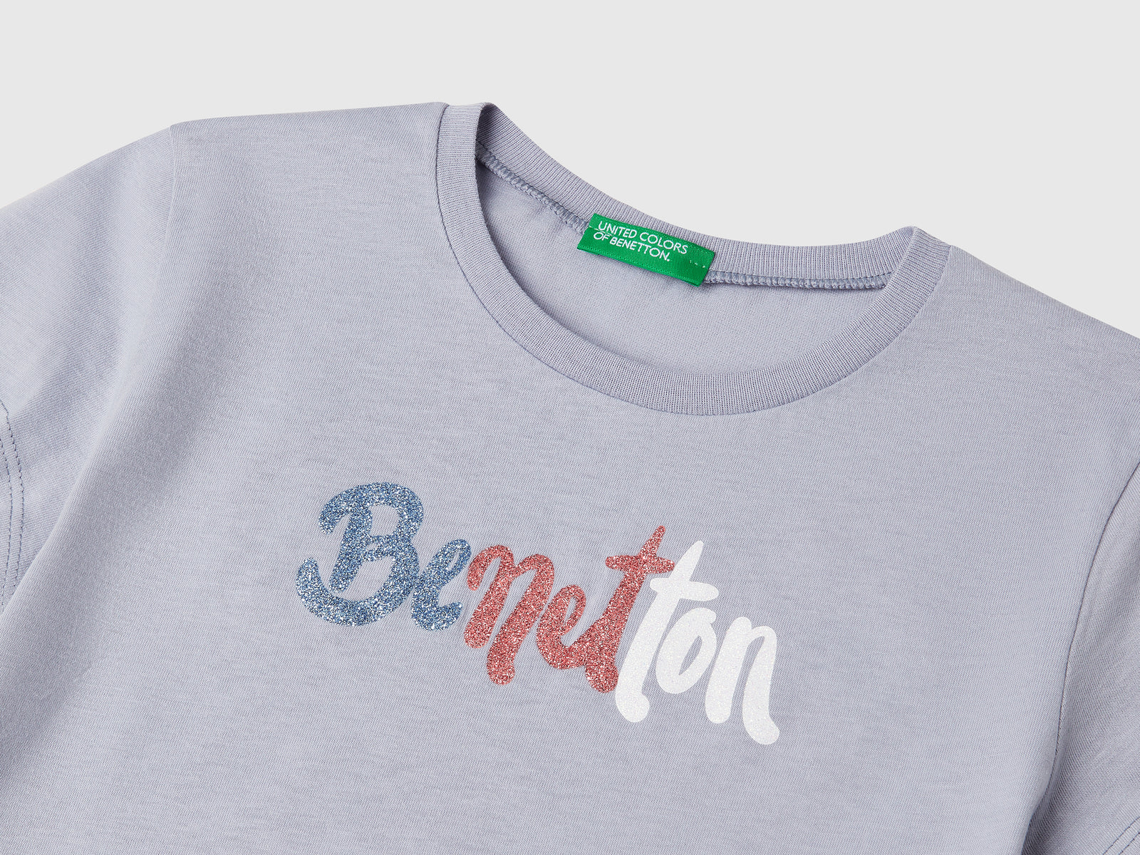 T-shirt con logo glitter in cotone da bambina pervinca 3 | Benetton Outlet