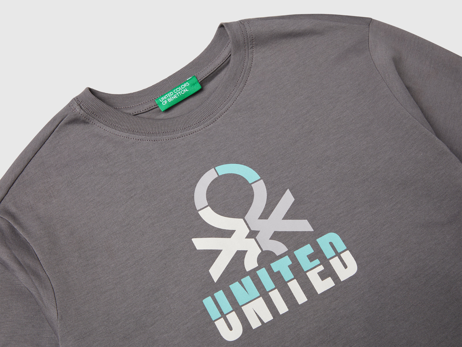 T-shirt in cotone da bambino grigio scuro 3 | Benetton Outlet