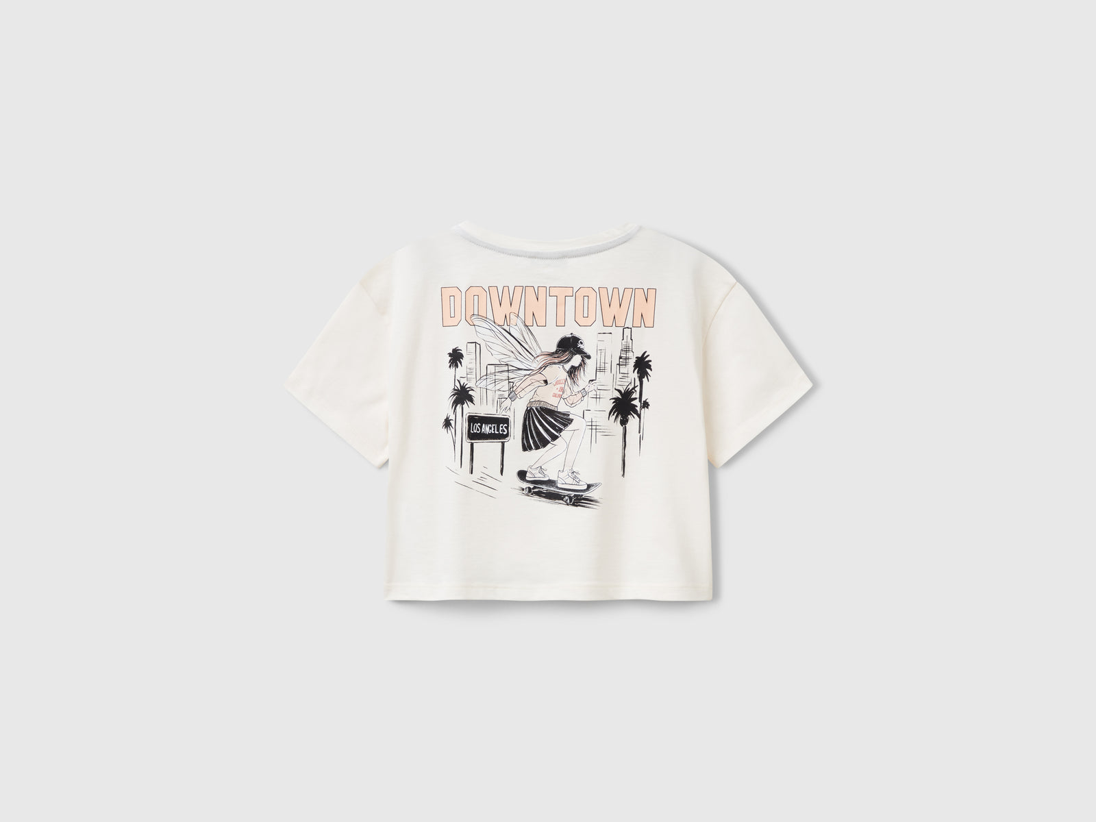 T-shirt boxy fit con stampa sul retro da bambina bianco panna 2 | Benetton Outlet