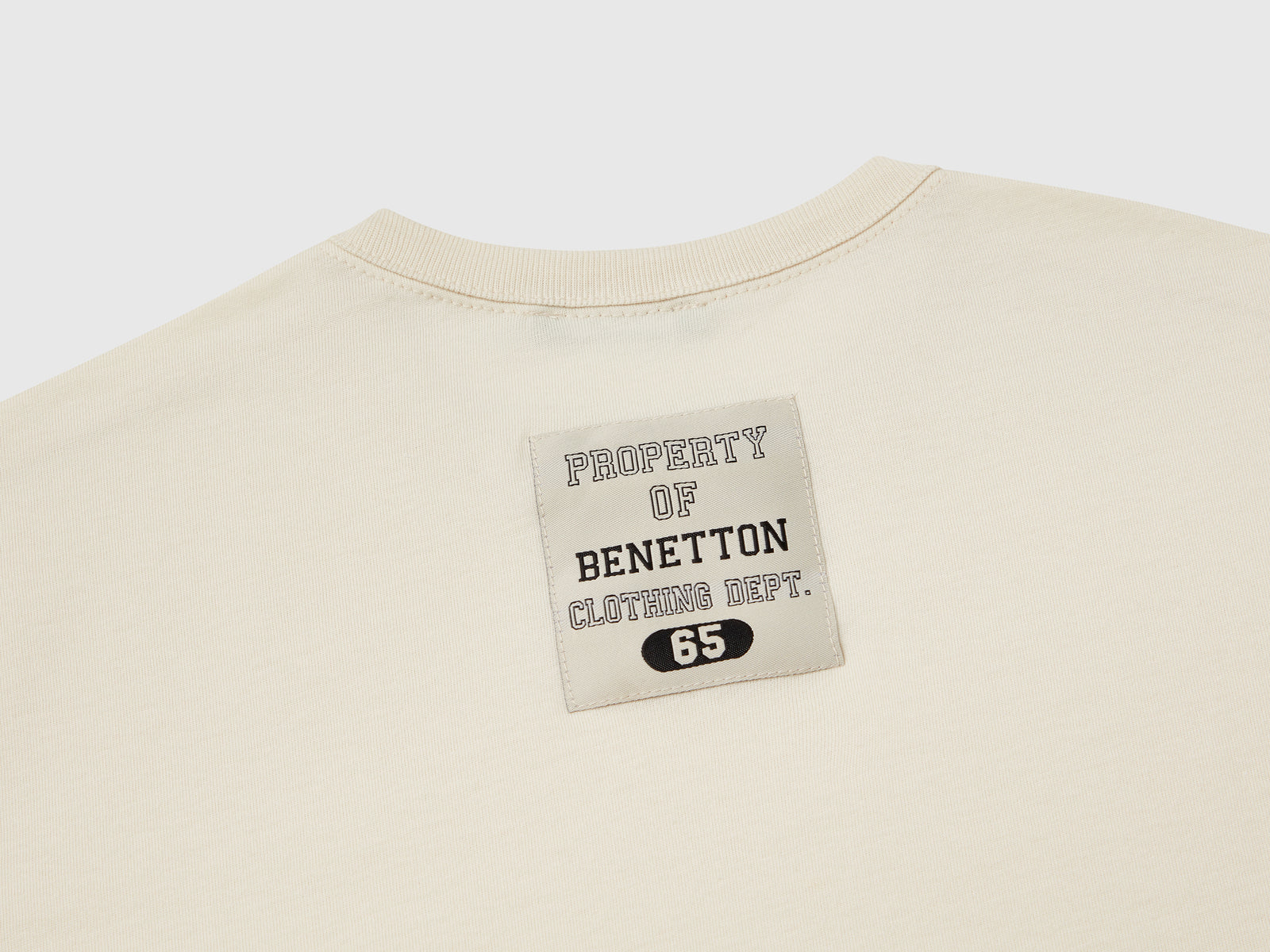 T-shirt con logo over fit da bambino beige 3 | Benetton Outlet