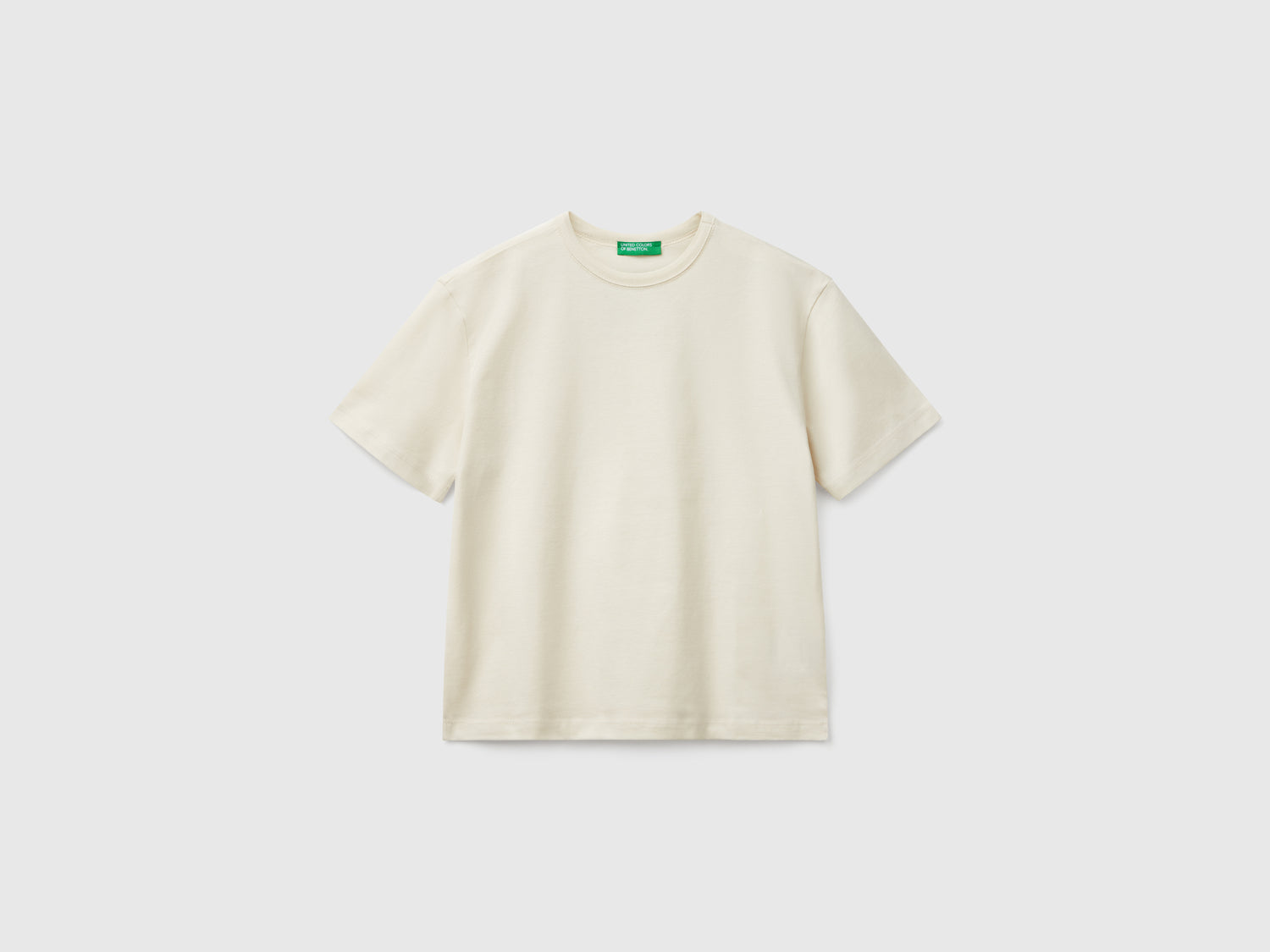 T-shirt con logo over fit da bambino beige | Benetton Outlet