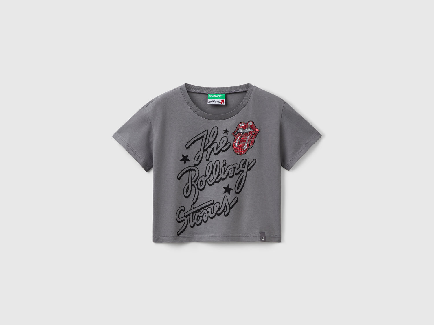 T-shirt cropped "The Rolling Stones" da bambina grigio scuro | Benetton Outlet