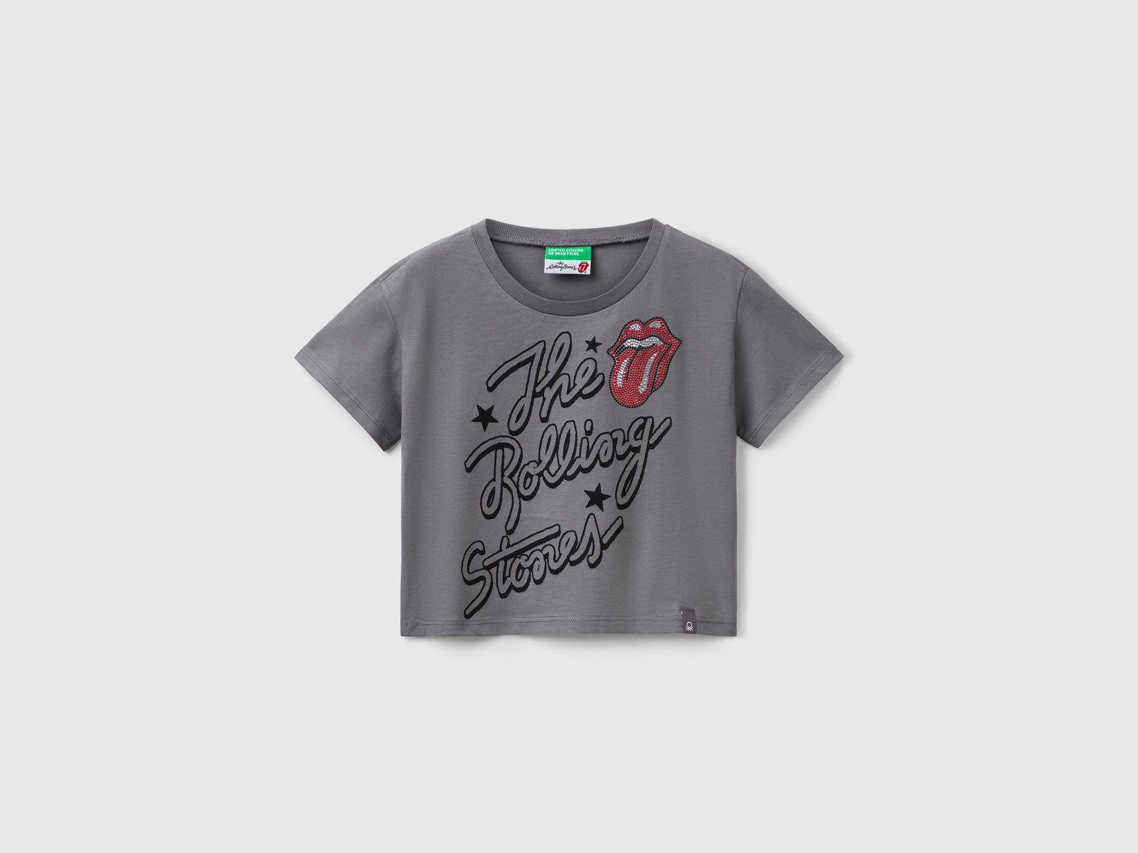 T-shirt cropped "The Rolling Stones" da bambina grigio scuro | Benetton Outlet
