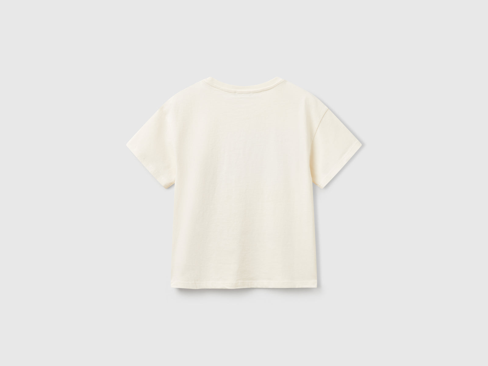 Maglietta con stampa e paillettes da bambina bianco panna 2 | Benetton Outlet