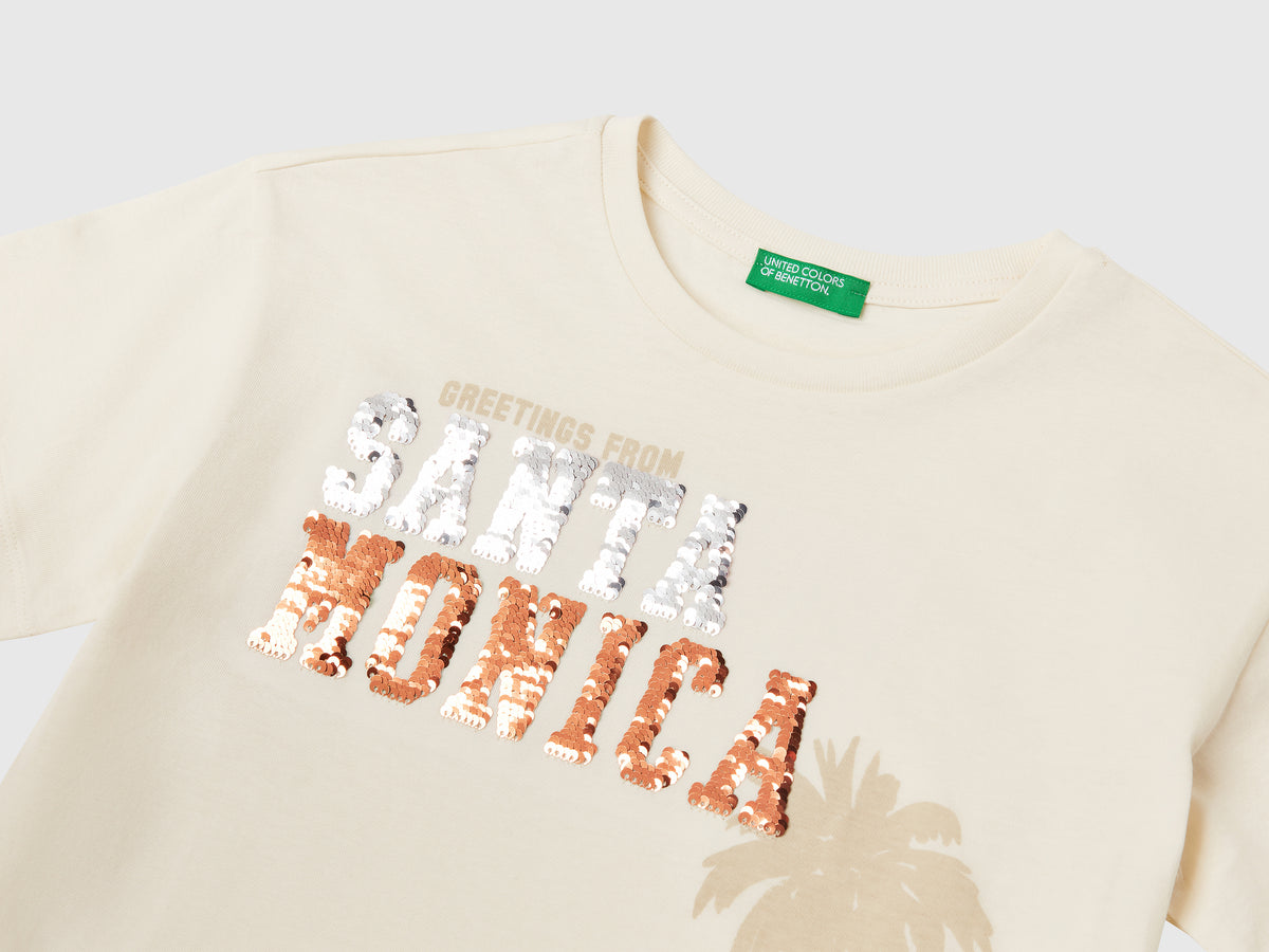 Maglietta con stampa e paillettes