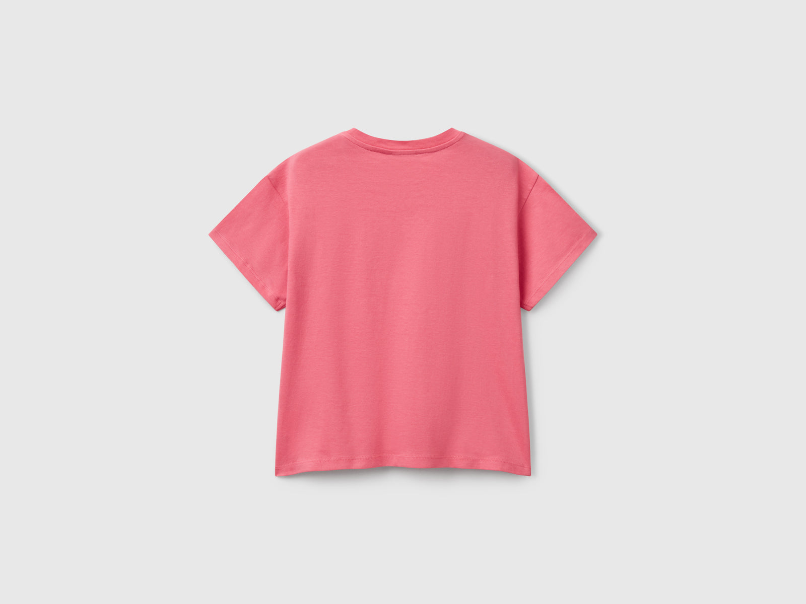Maglietta con stampa e paillettes da bambina salmone 2 | Benetton Outlet