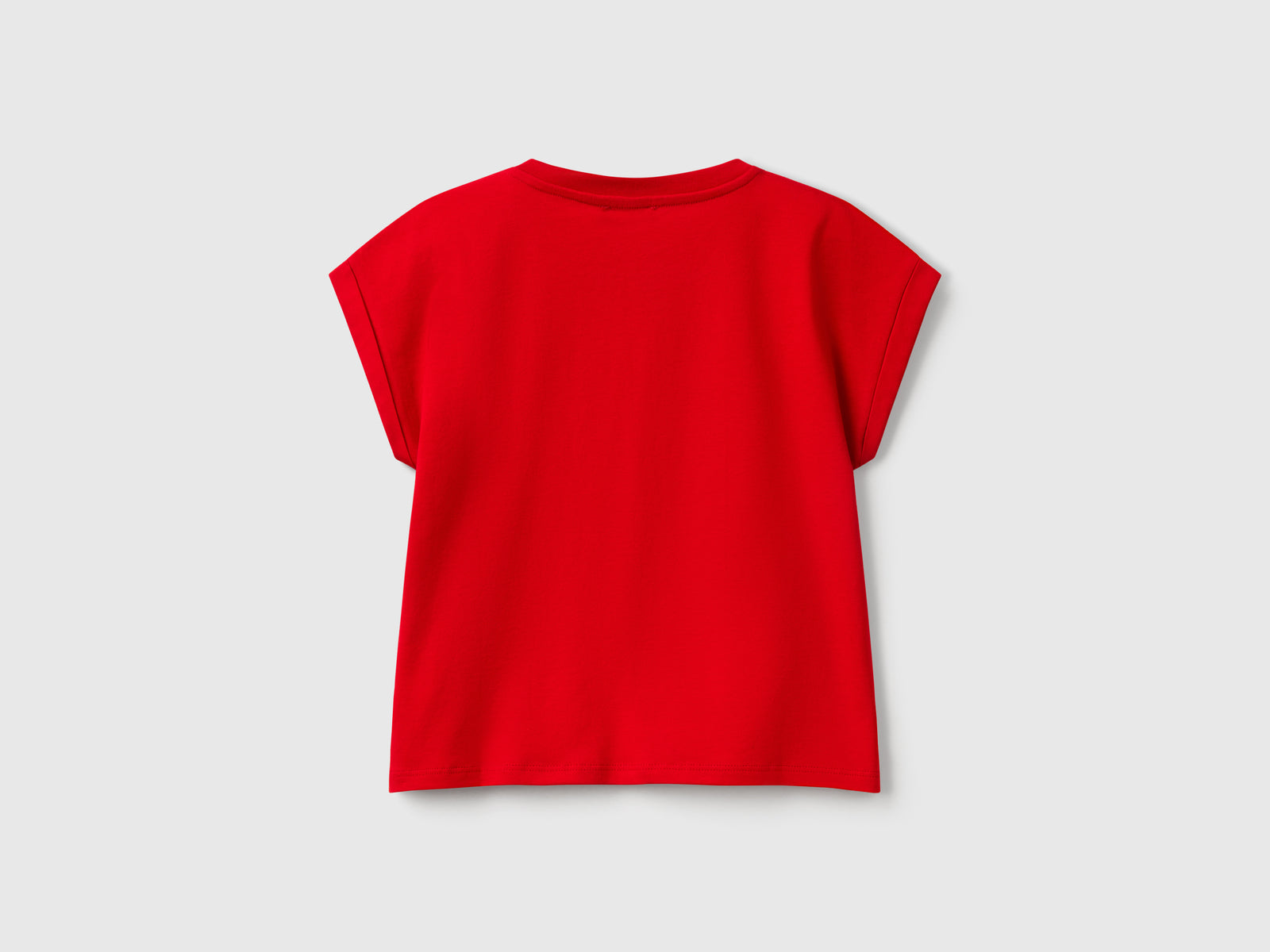 Maglietta boxy fit con stampa e glitter da bambina rosso 2 | Benetton Outlet