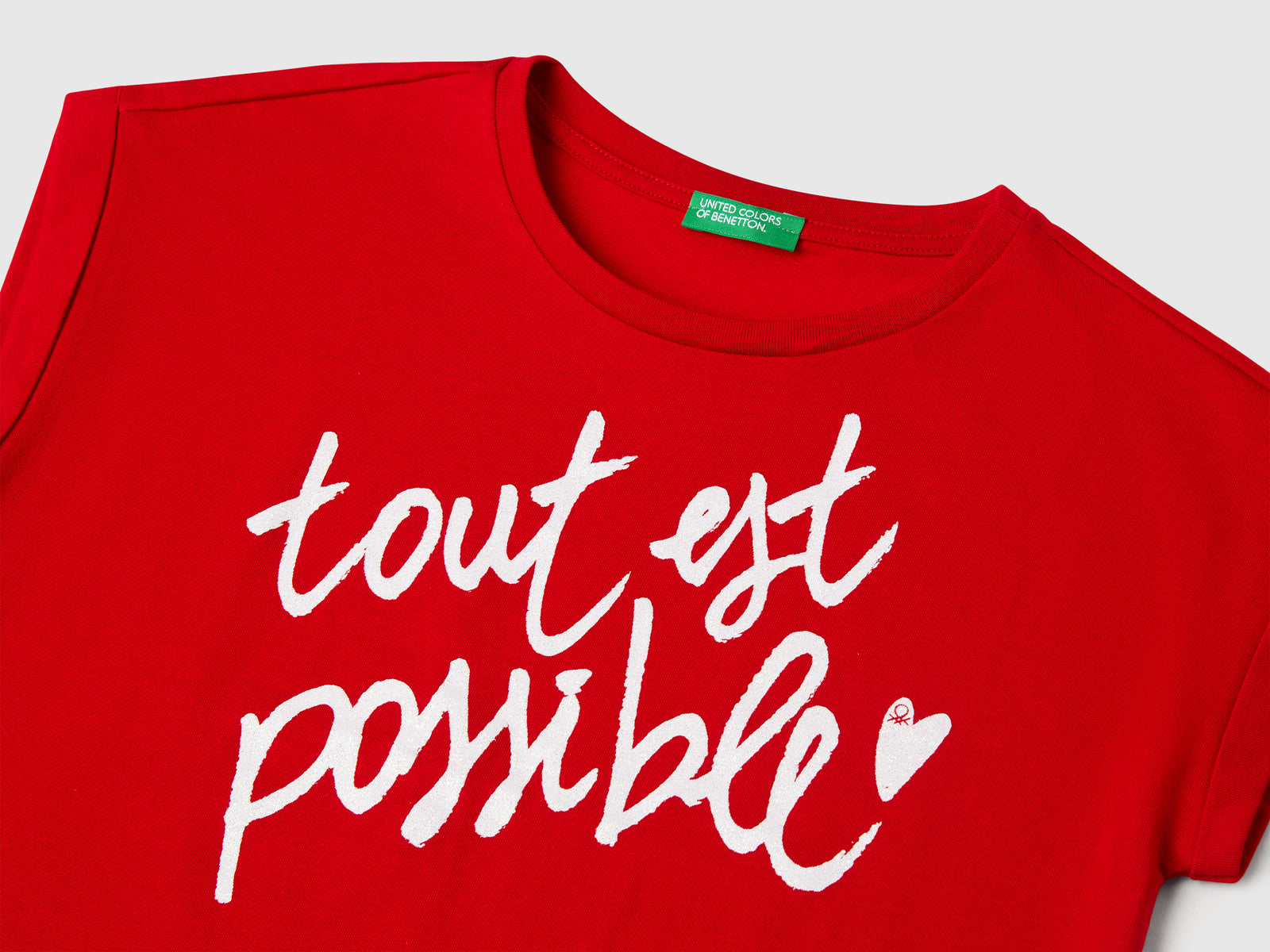 Maglietta boxy fit con stampa e glitter da bambina rosso 3 | Benetton Outlet