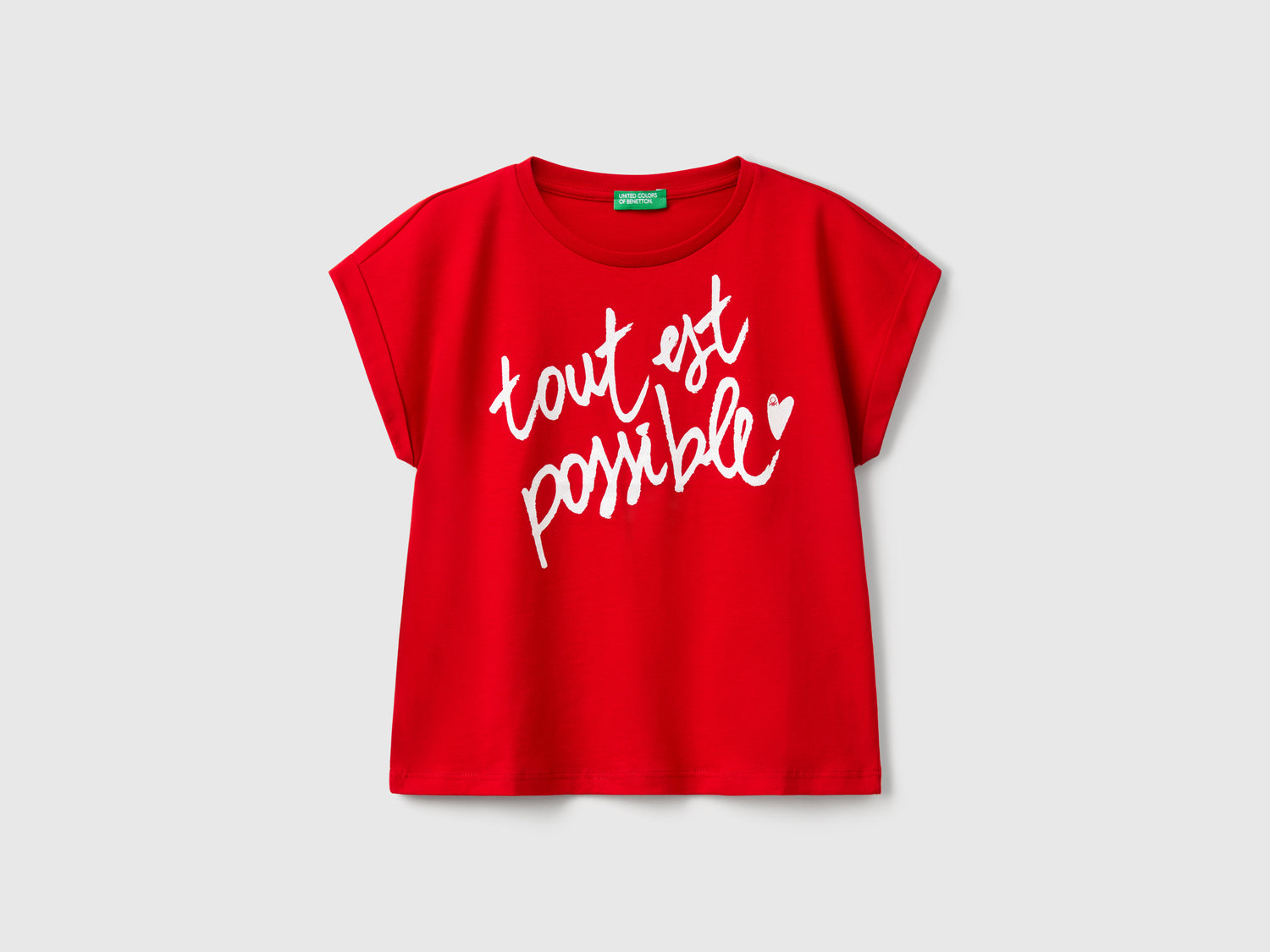 Maglietta boxy fit con stampa e glitter da bambina rosso | Benetton Outlet