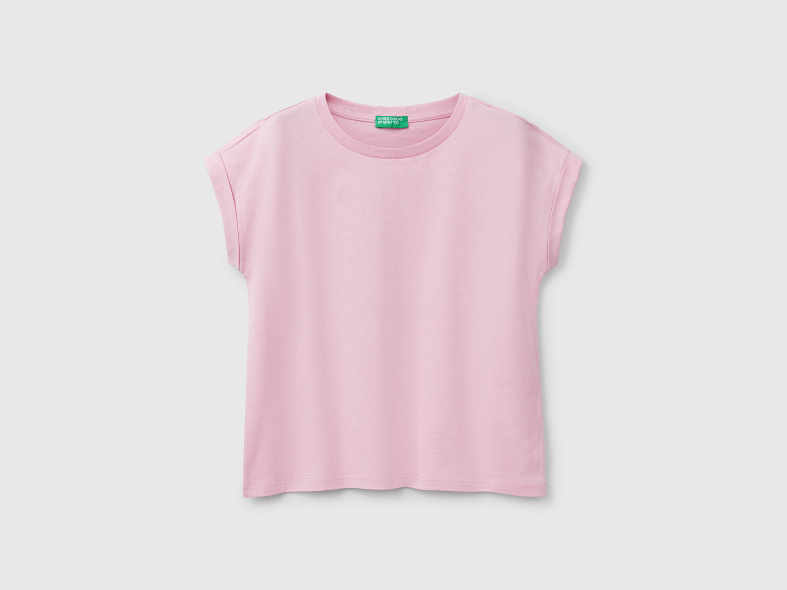 Maglietta boxy fit con stampa e glitter da bambina rosa | Benetton Outlet