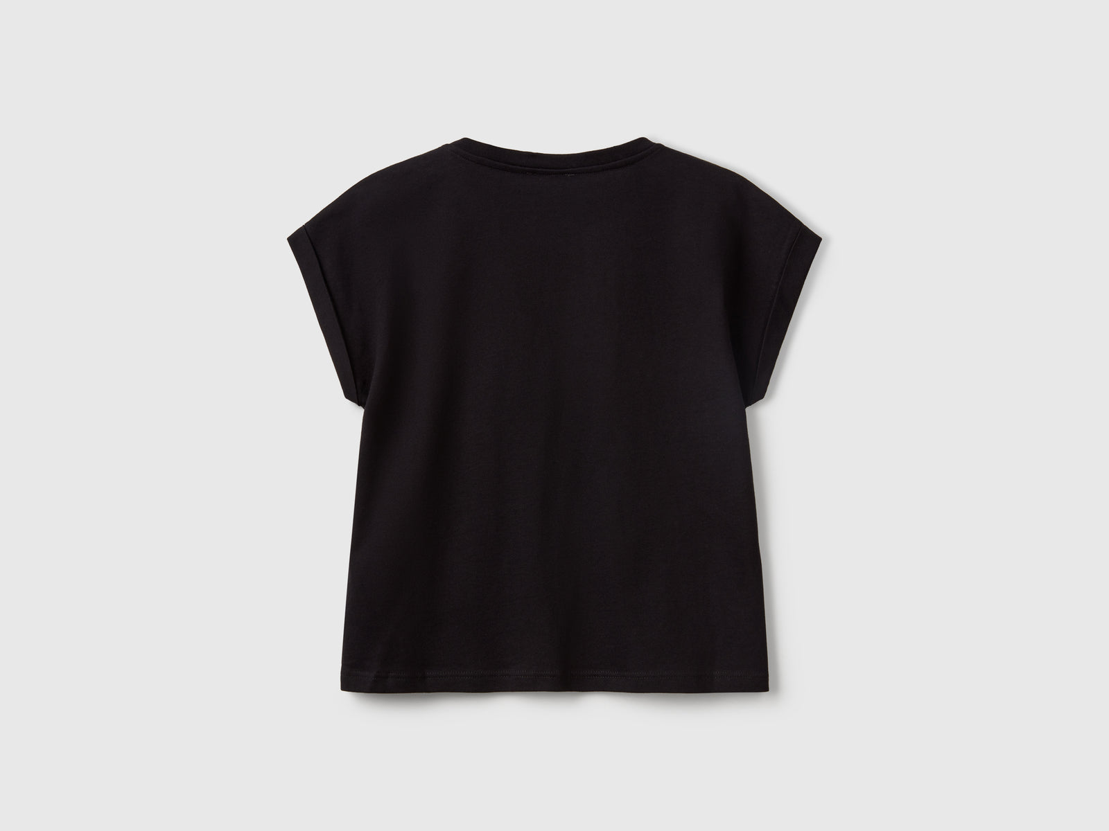 Maglietta boxy fit con stampa e glitter da bambina nero 2 | Benetton Outlet