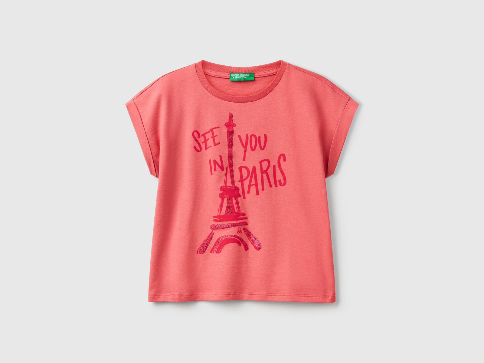 Maglietta boxy fit con stampa e glitter da bambina salmone | Benetton Outlet