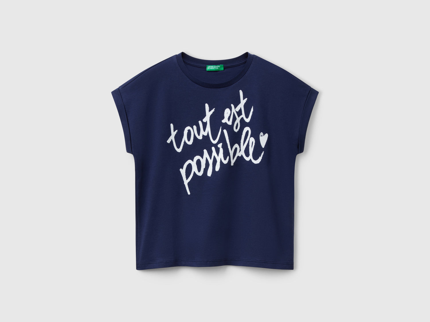 Maglietta boxy fit con stampa e glitter da bambina blu scuro | Benetton Outlet