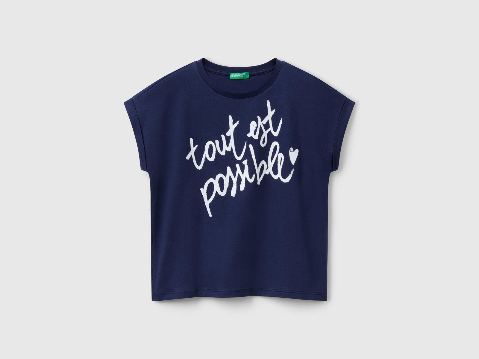 Maglietta boxy fit con stampa e glitter da bambina blu scuro | Benetton Outlet