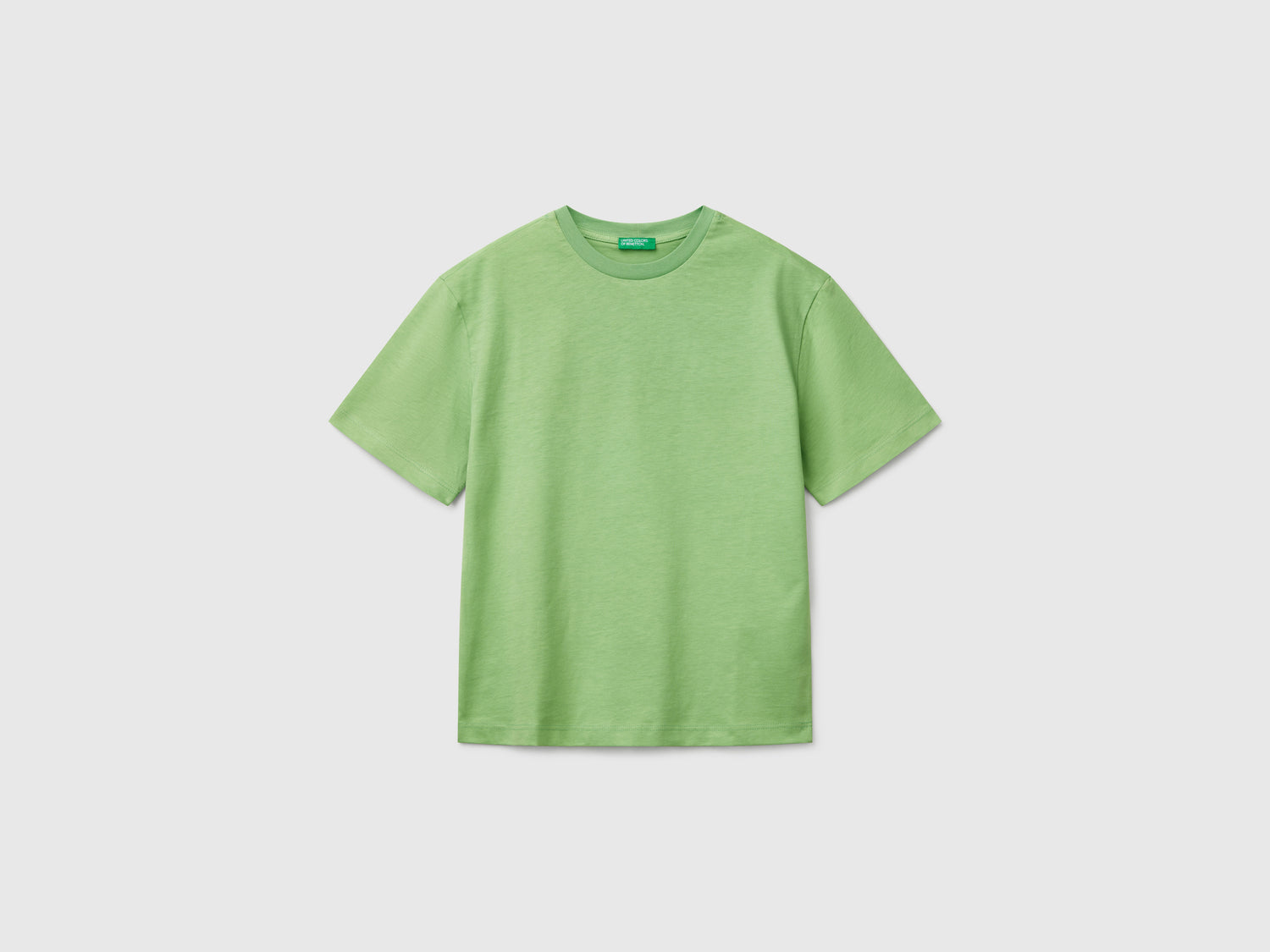 T-shirt manica corta in cotone da bambino verde | Benetton Outlet