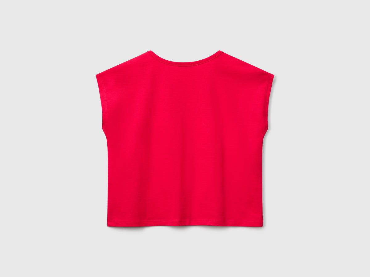 T-shirt con stampa e paillettes