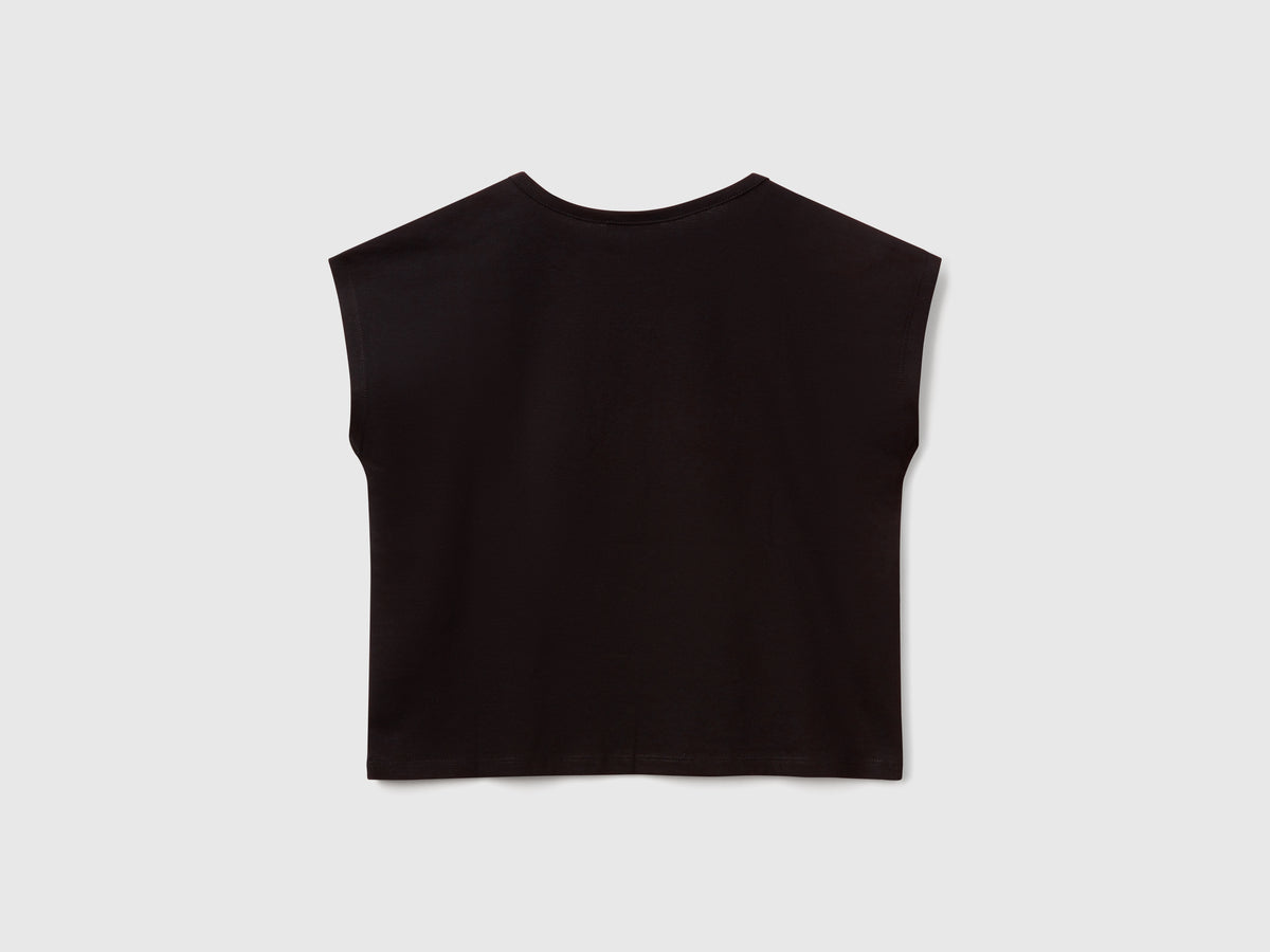 T-shirt con stampa e paillettes