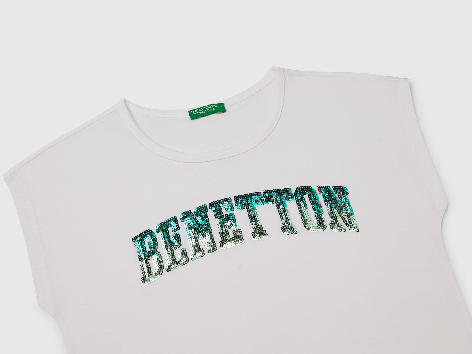 T-shirt con paillettes da bambina bianco 3 | Benetton Outlet