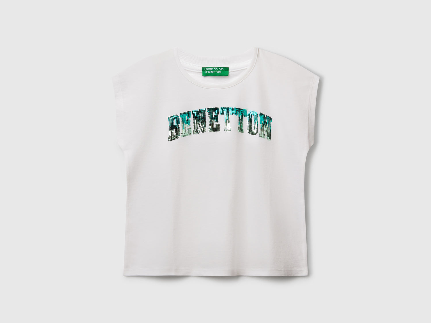 T-shirt con paillettes da bambina bianco | Benetton Outlet
